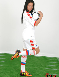 Russian babe in soccer gear stripping down to play ball